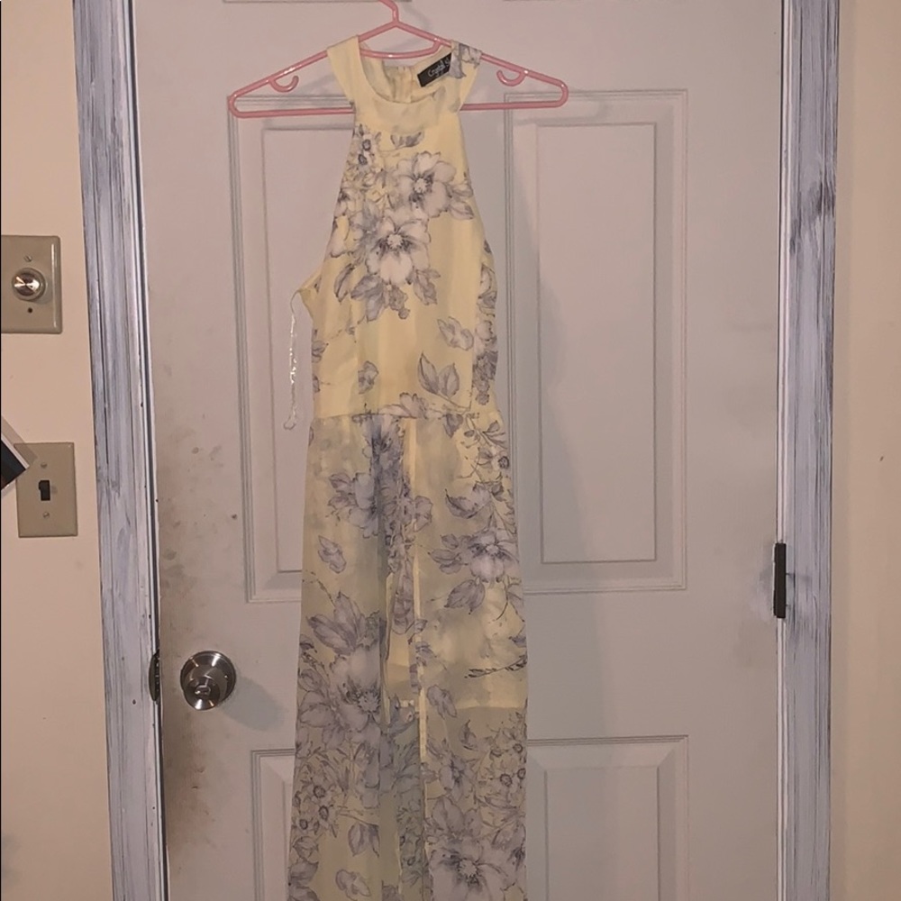 Romper in the front but dress look from the back